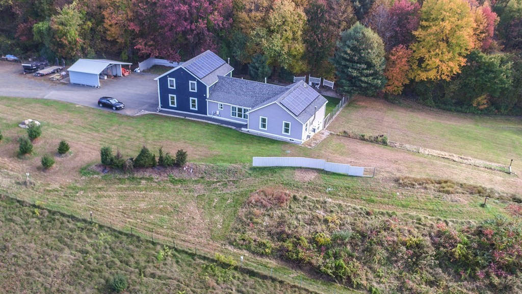 96 Cold Hill Granby, MA 01033 - Photo 6 of 42 an aerial view of a house with a yard