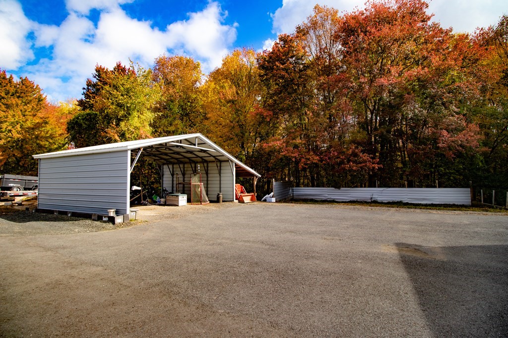 96 Cold Hill Granby, MA 01033 - Photo 8 of 42 a front view of a house with a yard