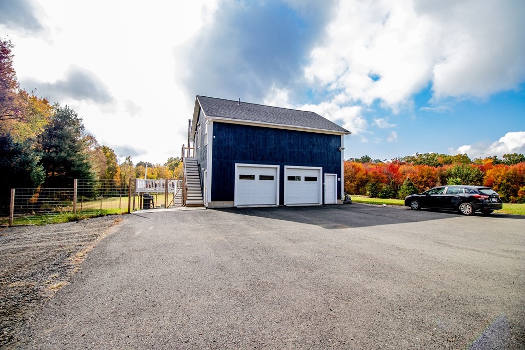96 Cold Hill Granby, MA 01033 - Photo 9 of 42 a house with trees in front of it