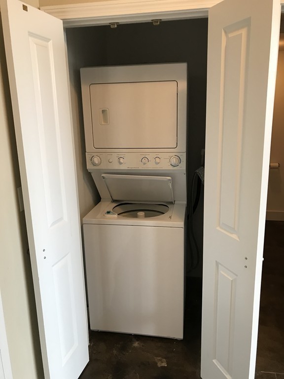 21 Illinois Street, Unit 402 Worcester, MA 01610 - Photo 16 of 16 a utility room with dryer and washer