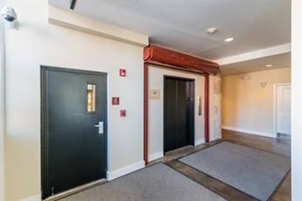 21 Illinois Street, Unit 402 Worcester, MA 01610 - Photo 4 of 16 a view of elevator