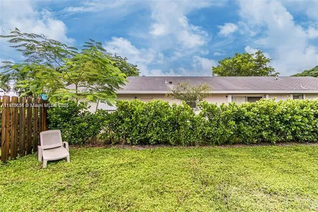 a view of a backyard of house