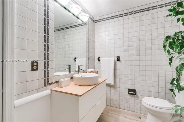 a bathroom with a sink and a shower