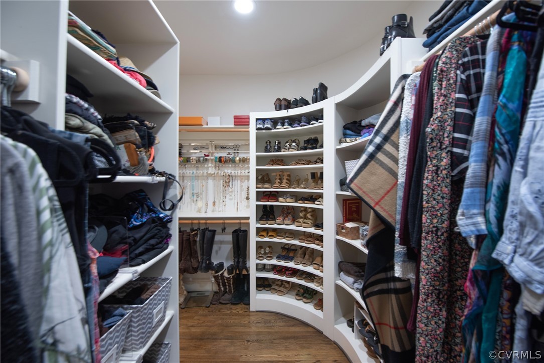 6310 Three Chopt Road Richmond, VA 23226 - Photo 17 of 48 Her walk-in closet in main level primary bedroom