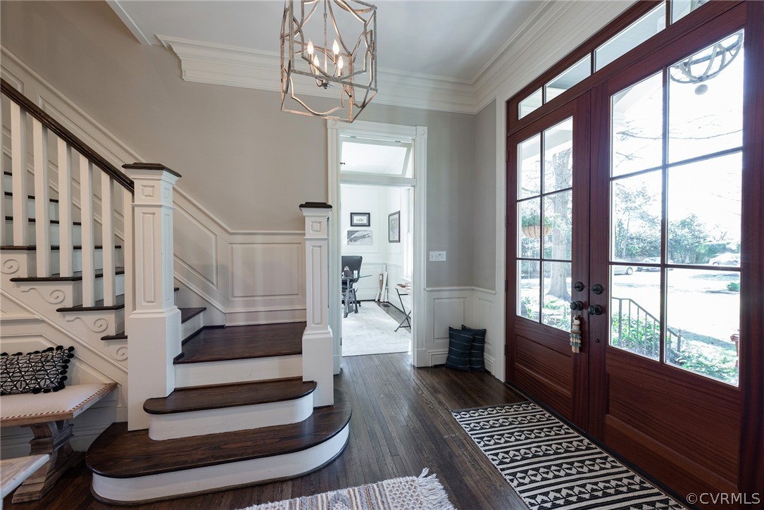 Foyer with dramatic custom double doors