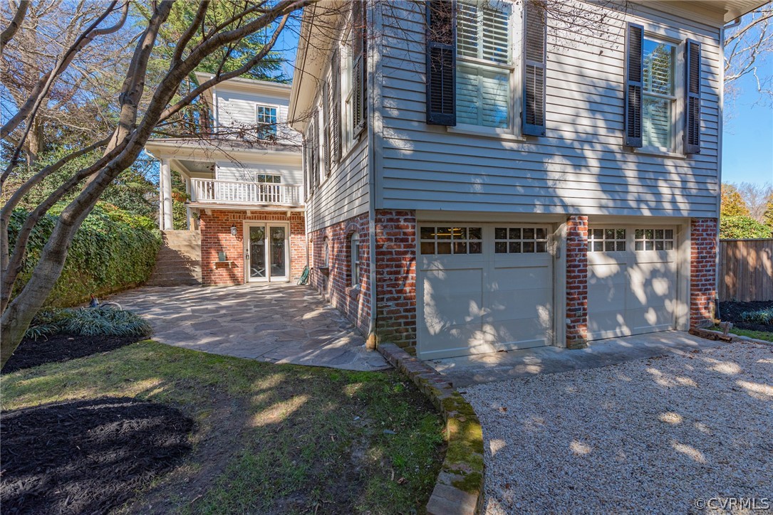 6310 Three Chopt Road Richmond, VA 23226 - Photo 45 of 48 View of two-car garage and walk-out lower level ar