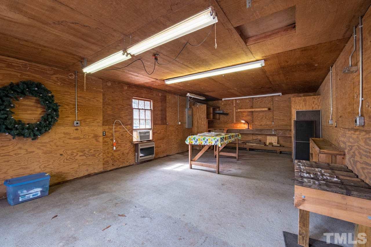 978 Chatham Church Road Moncure, NC 27559 - Photo 30 of 30 View of Half of 30'X30' Workshop area