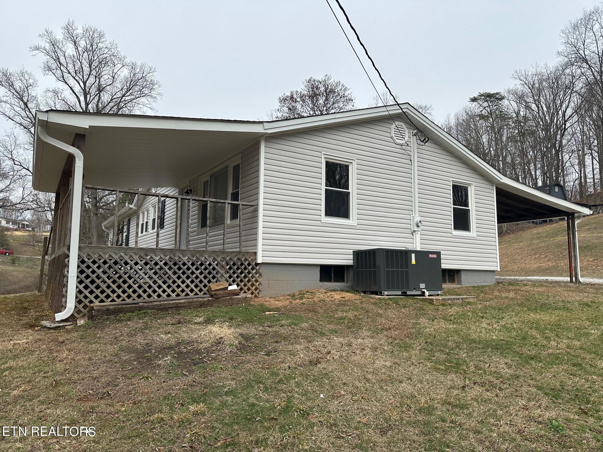 114 Martin Strader Lane Clinton, TN 37716 - Photo 3 of 34 Front 3 Porch Side