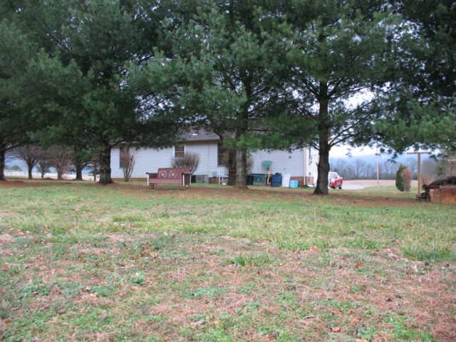 2405 Water Tank Road Winchester, TN 37398 - Photo 2 of 9 View of large back yard with plenty room for a garden.