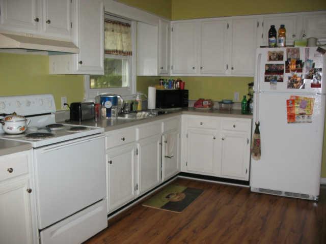 2405 Water Tank Road Winchester, TN 37398 - Photo 5 of 9 Kitchen, newly installed laminate flooring and all applicances stay.