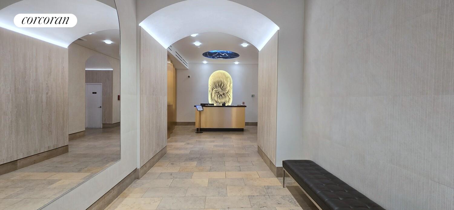 225 8th Avenue, Unit 5E Manhattan, NY 10011 - Photo 10 of 13 a view of a hallway view with staircase