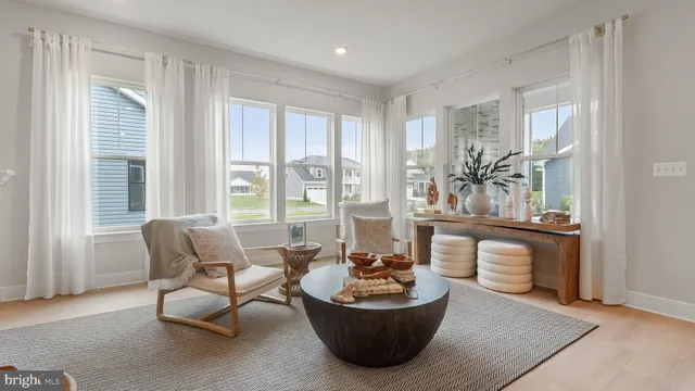 a bed room with a bed and a lamp