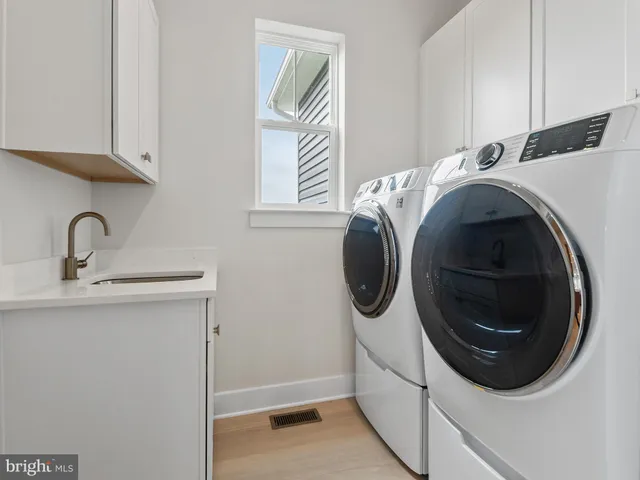a front view of a house with a garage