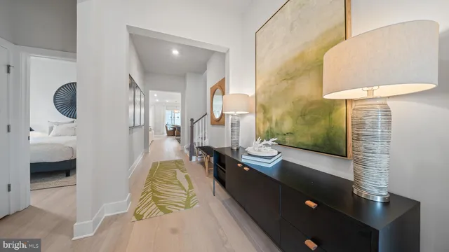 a kitchen with stainless steel appliances kitchen island granite countertop a sink and cabinets