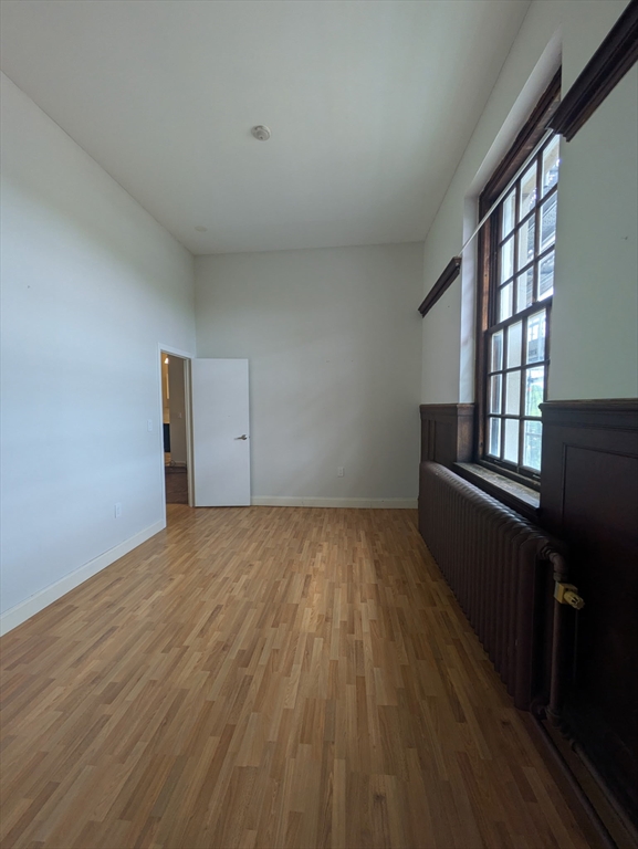 16 Balmoral Street, Unit 415 Andover, MA 01810 - Photo 4 of 4 wooden floor in an empty room
