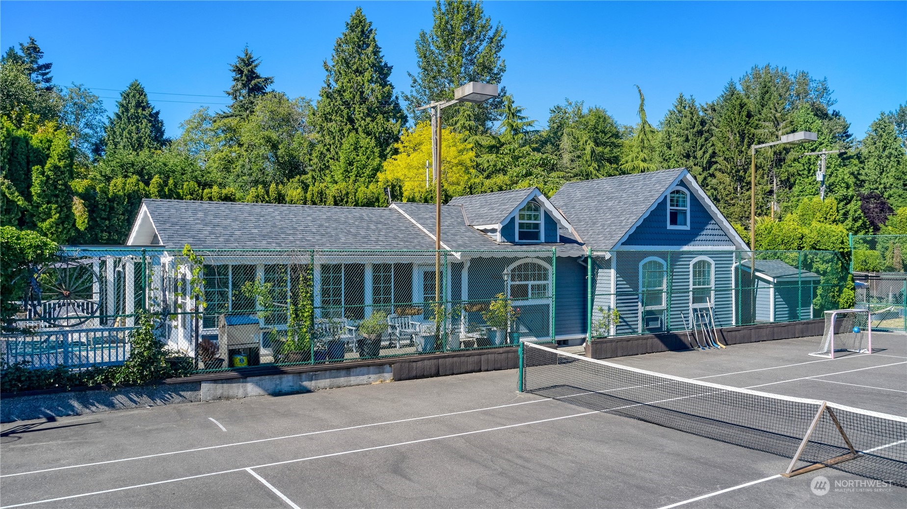 1280 Gulf View Crescent Point Roberts, WA 98281 - Photo 2 of 2 a front view of a house with a garden