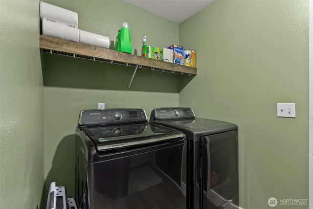 a kitchen with sink and cabinets