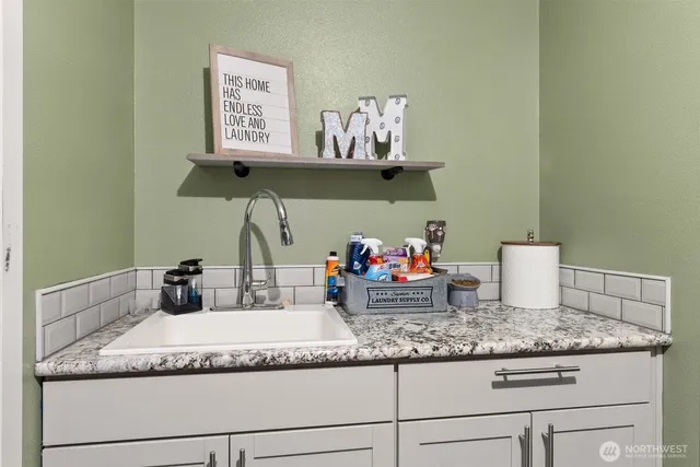 a view of yard from outdoor seating area