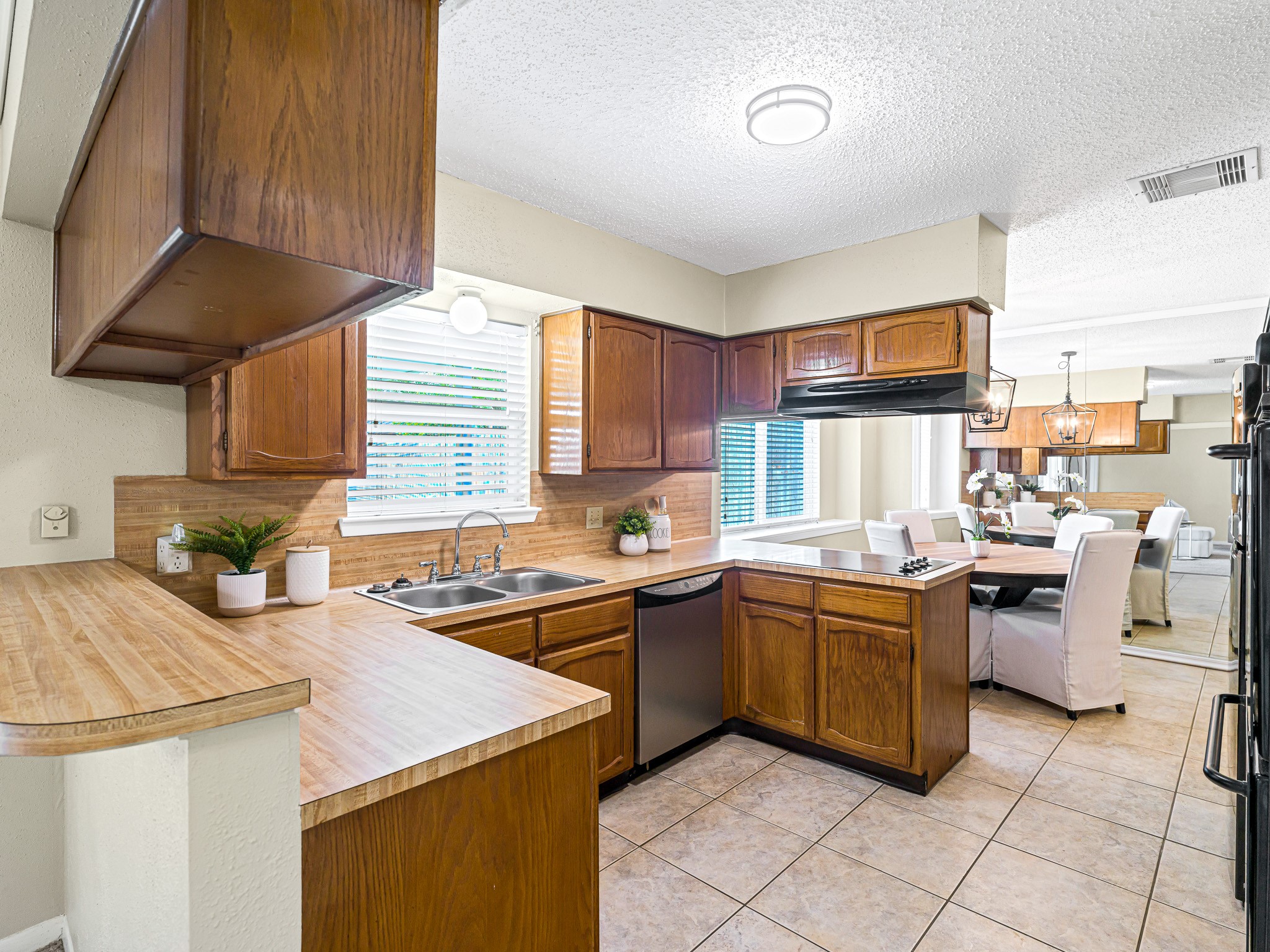 6230 Sunnygate Drive Spring, TX 77373 - Photo 11 of 33 Efficient U-shaped kitchen offers great prep space.