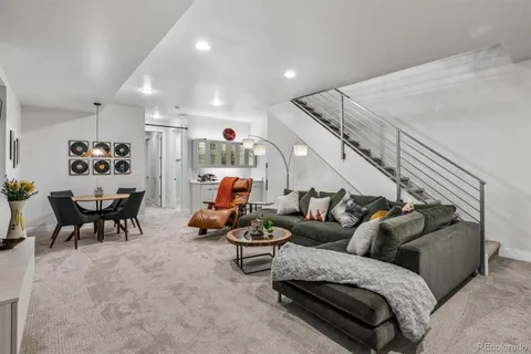 a living room with furniture and a couch