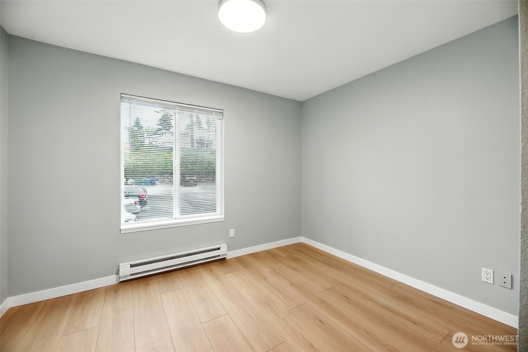 3233 Northeast 12th Street, Unit 207 Renton, WA 98056 - Photo 25 of 40 an empty room with a window