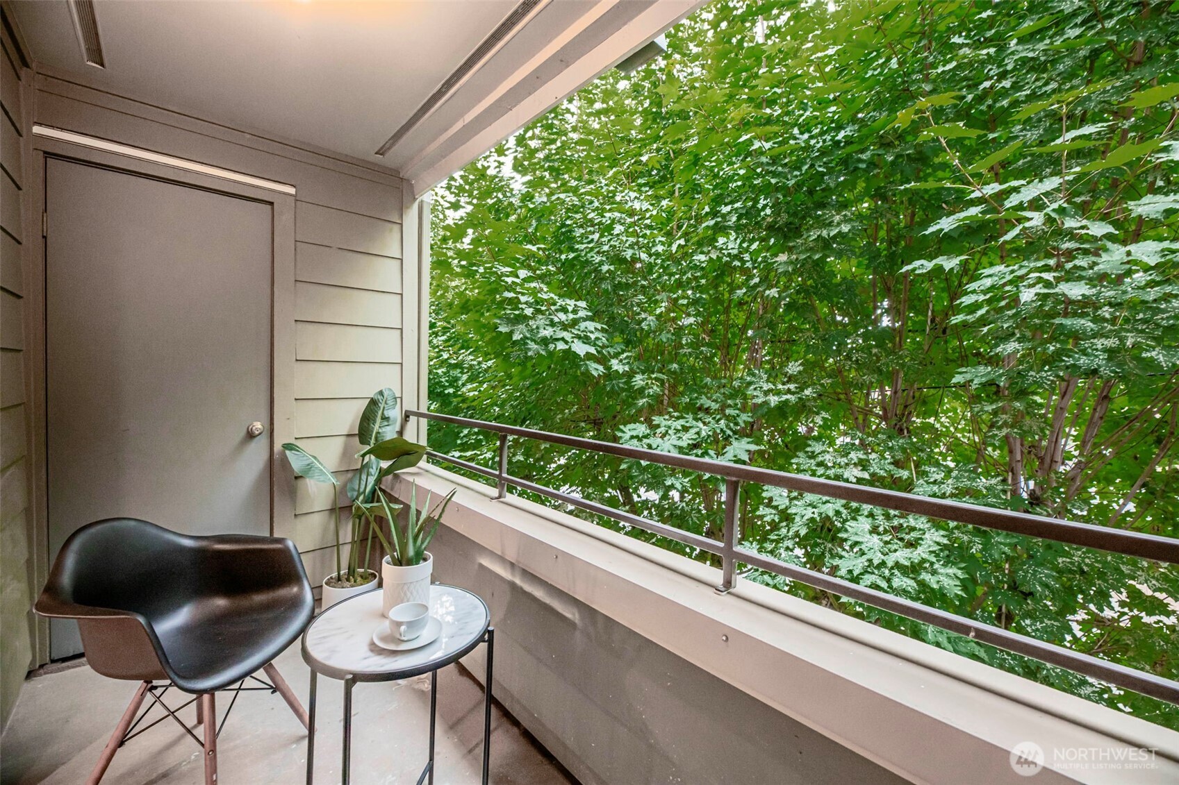 3233 Northeast 12th Street, Unit 207 Renton, WA 98056 - Photo 27 of 40 a view of a balcony with chairs