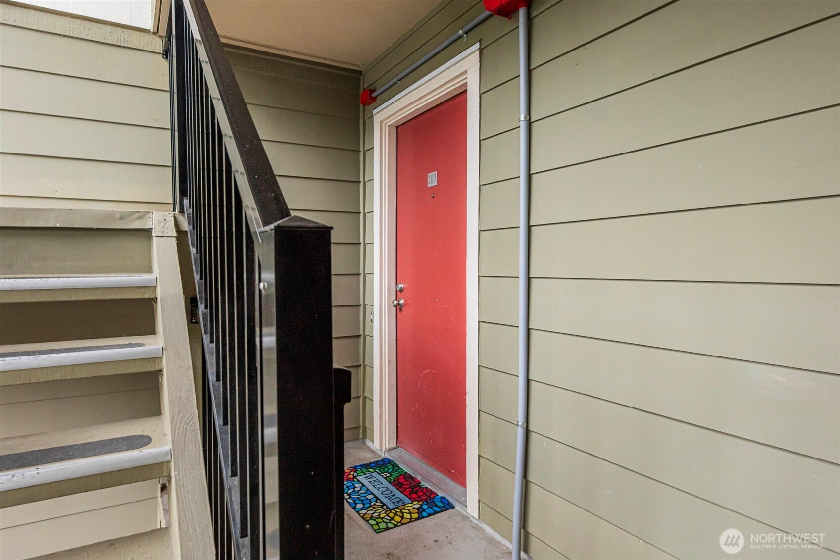 3233 Northeast 12th Street, Unit 207 Renton, WA 98056 - Photo 3 of 40 a bathroom with a shower