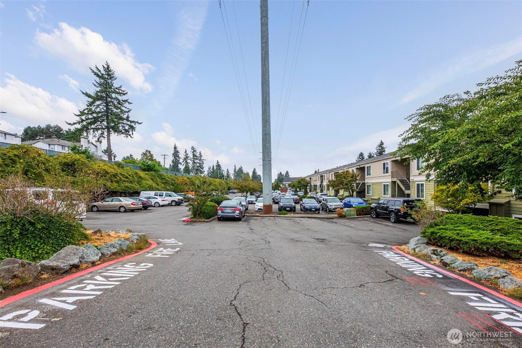 3233 Northeast 12th Street, Unit 207 Renton, WA 98056 - Photo 32 of 40 a view of a street with cars