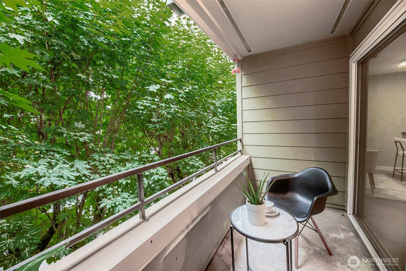 3233 Northeast 12th Street, Unit 207 Renton, WA 98056 - Photo 7 of 40 a balcony view with a seating space