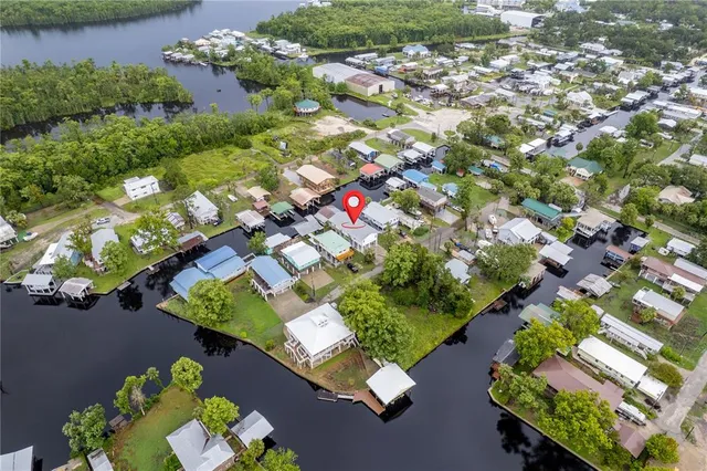 an aerial view of a house with a garden
