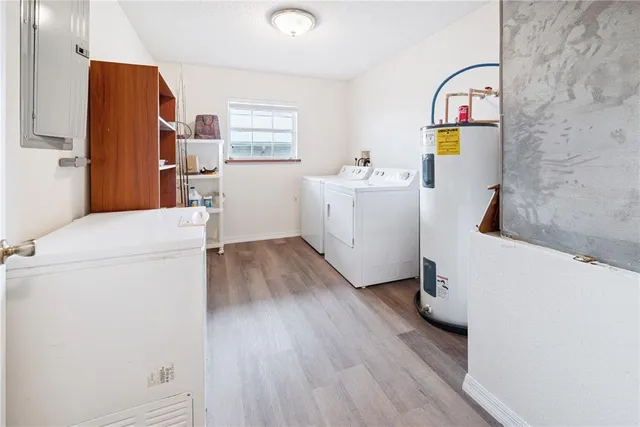 a bedroom with a bed window and a table