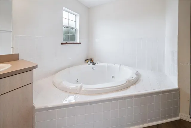 a room that has a plant and a window