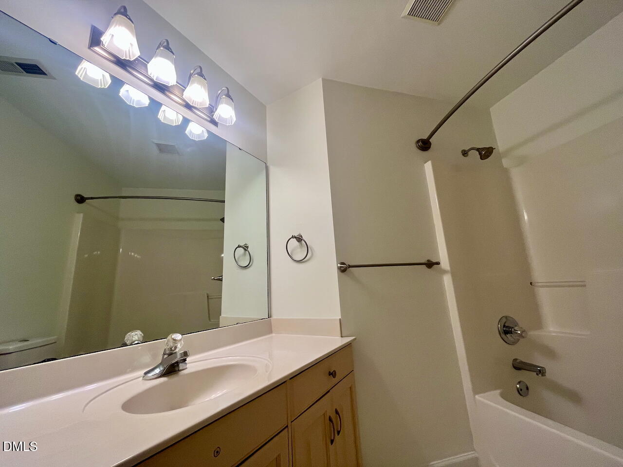 8528 Yucca Trail Raleigh, NC 27615 - Photo 14 of 25 a bathroom with a sink double vanity granite tub and shower