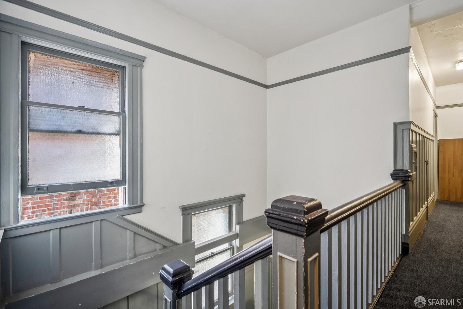 669 Ellis Street San Francisco, CA 94109 - Photo 18 of 32 a view of a hallway with a window
