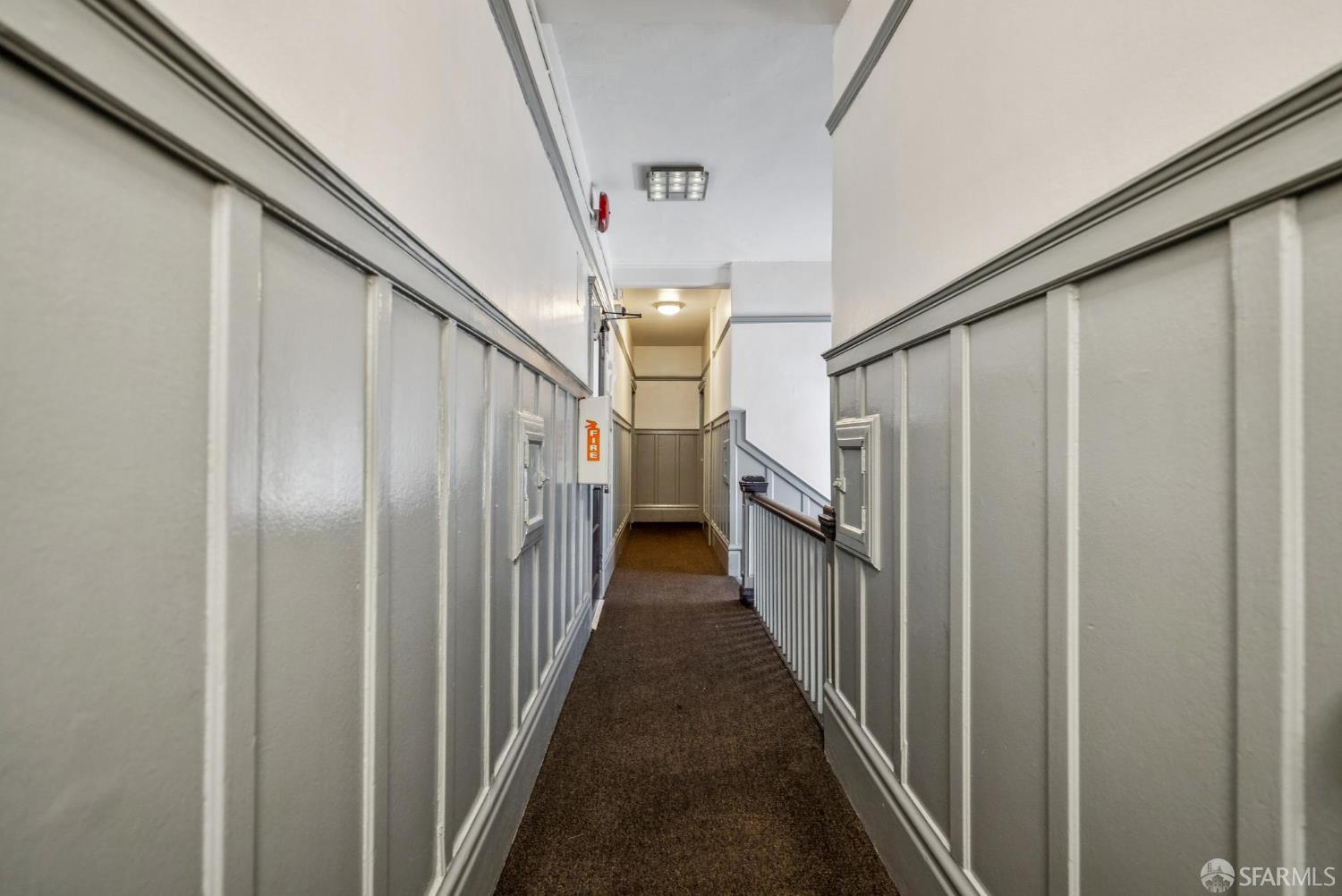 669 Ellis Street San Francisco, CA 94109 - Photo 20 of 32 a view of a hallway with stairs