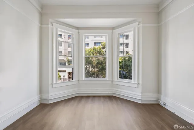 a view of a kitchen from the hallway