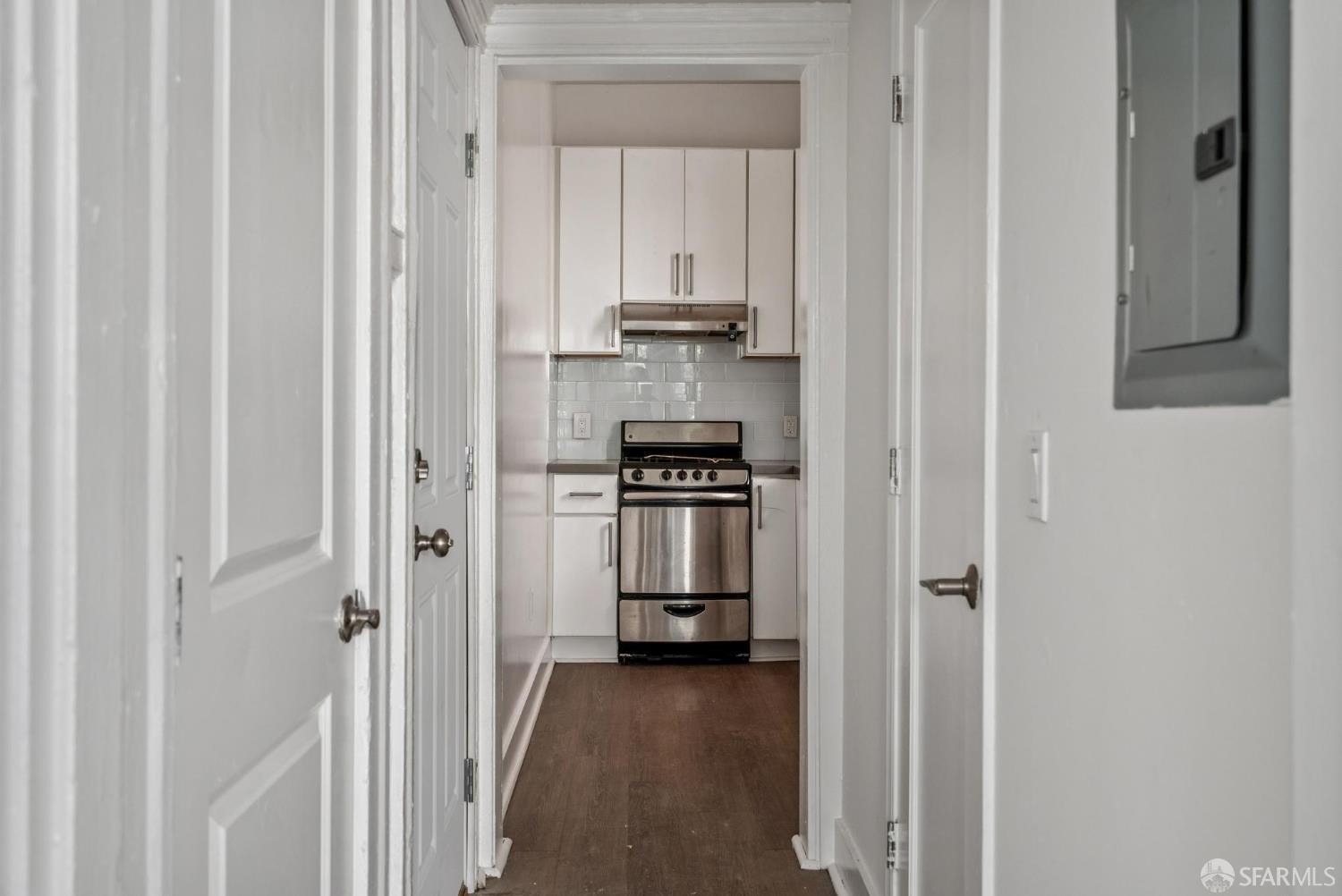 669 Ellis Street San Francisco, CA 94109 - Photo 24 of 32 a view of a kitchen from the hallway