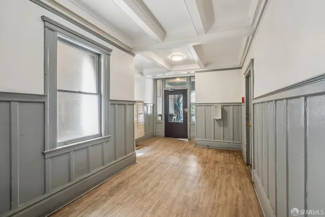 a view of entryway with wooden floor