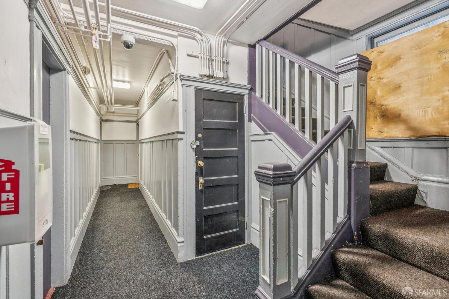 669 Ellis Street San Francisco, CA 94109 - Photo 8 of 32 a view of staircase with wooden floor and stairs