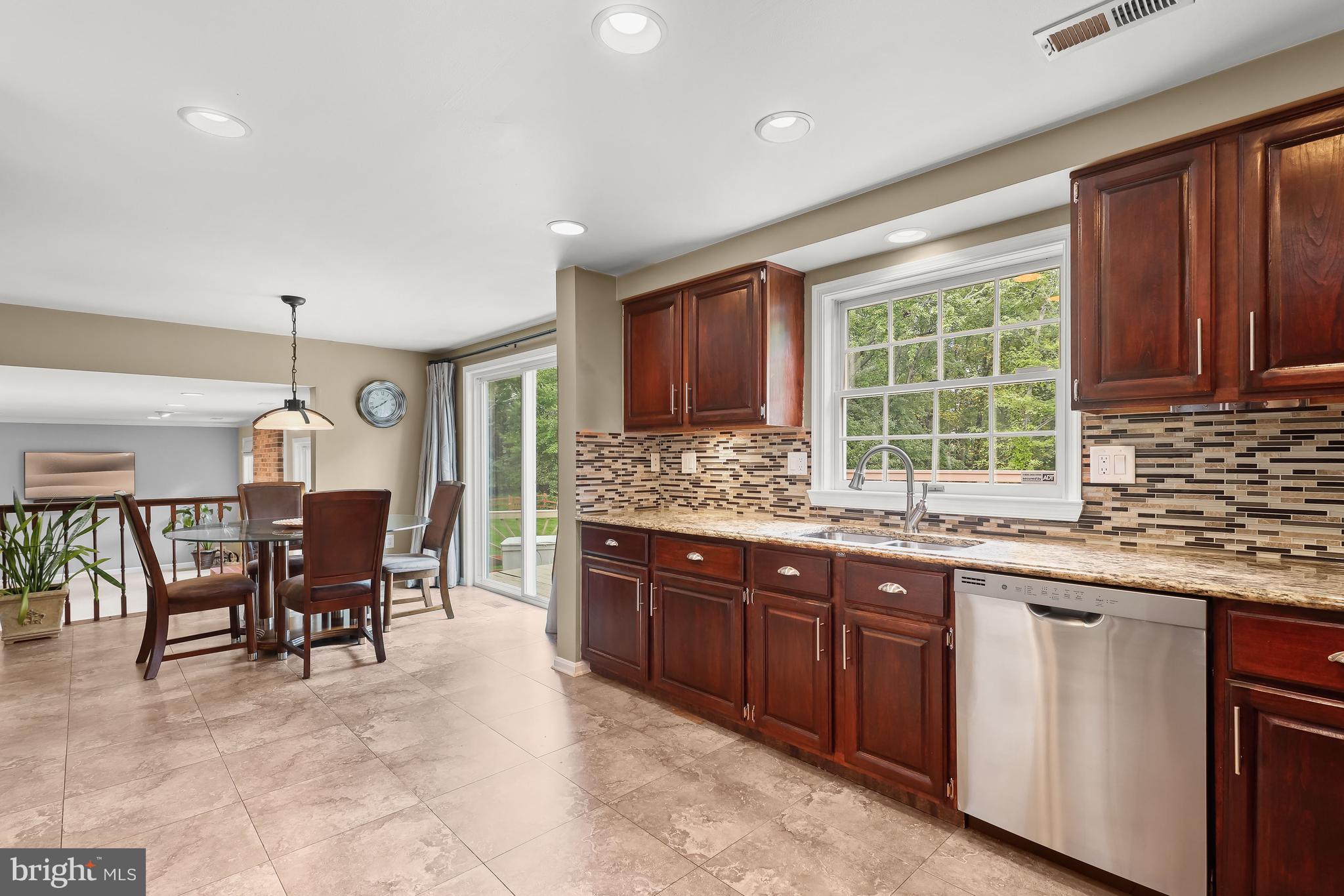 6367 Saddle Drive Columbia, MD 21045 - Photo 14 of 51 Granite kitchen and breakfast nook