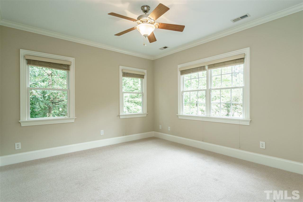1801 Bowling Green Trail Raleigh, NC 27613 - Photo 16 of 25 a view of an empty room with a window