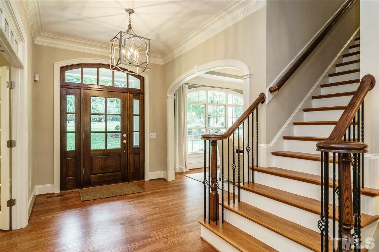 1801 Bowling Green Trail Raleigh, NC 27613 - Photo 3 of 25 en view interior of a house with wooden floor fan and windows