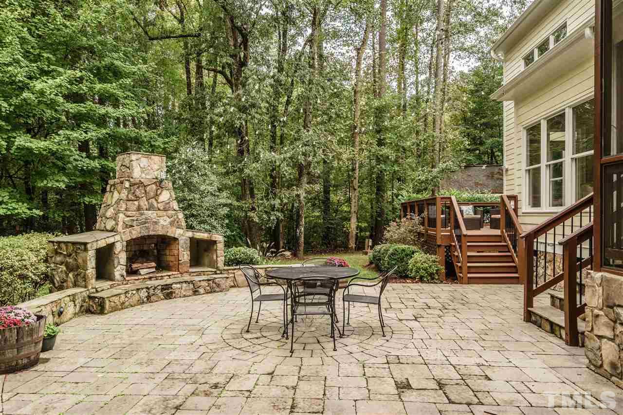 1801 Bowling Green Trail Raleigh, NC 27613 - Photo 24 of 25 a outdoor space with chairs