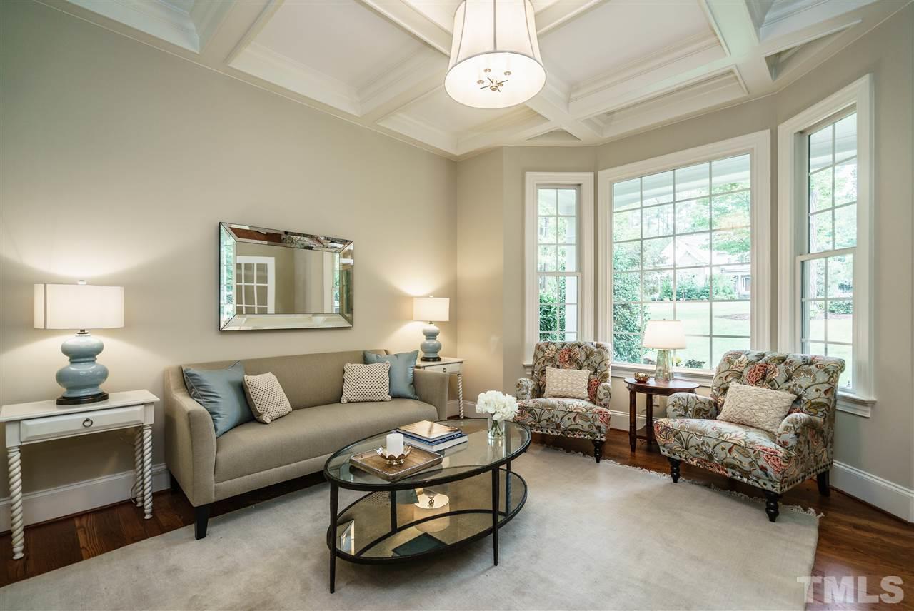 1801 Bowling Green Trail Raleigh, NC 27613 - Photo 4 of 25 a living room with furniture and a large window