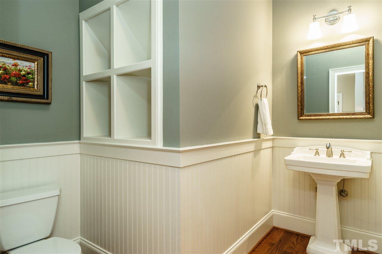 1801 Bowling Green Trail Raleigh, NC 27613 - Photo 10 of 25 a bathroom with a sink and mirror