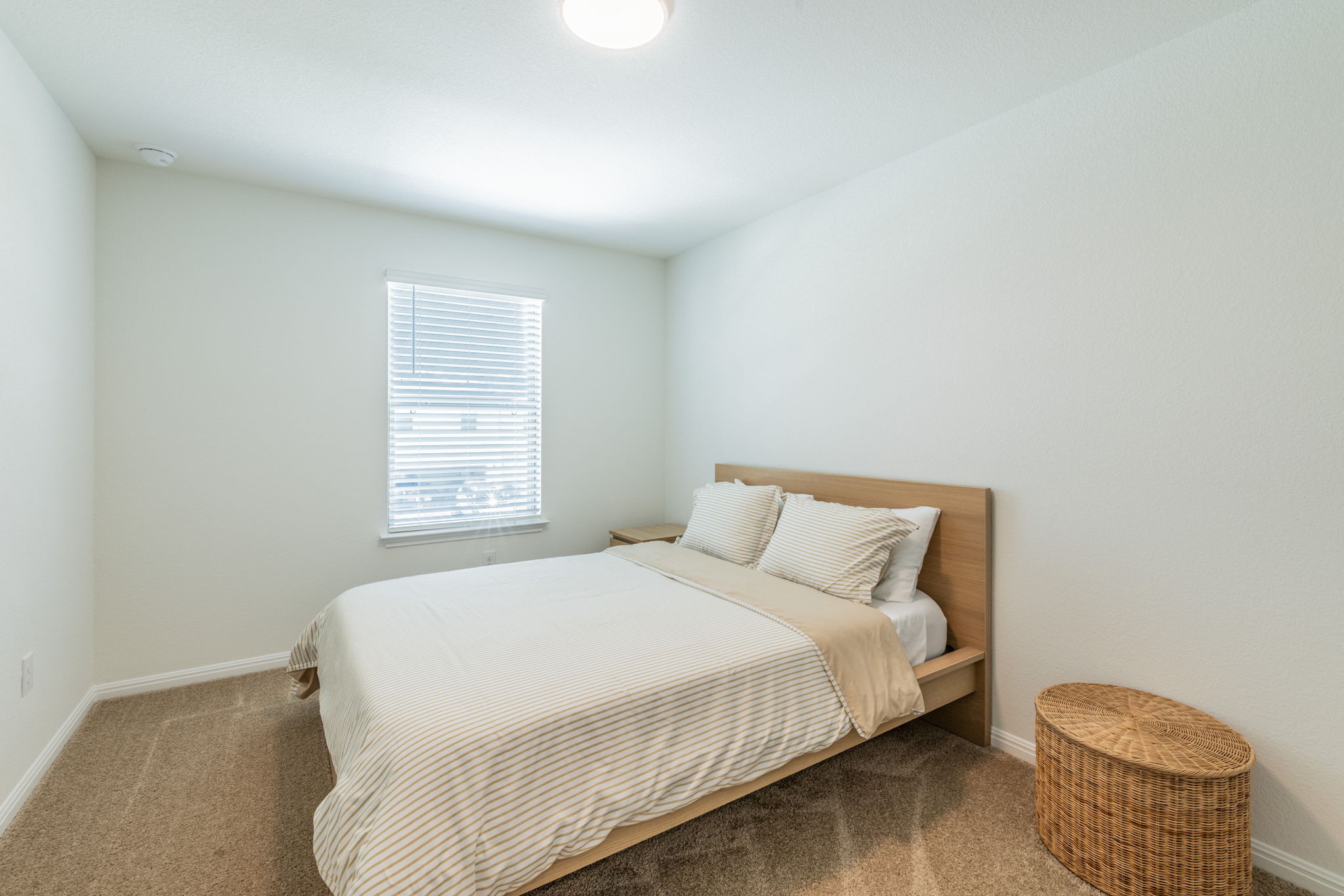 593 Backstays Loop Kyle, TX 78640 - Photo 15 of 26 a bedroom with a bed and window