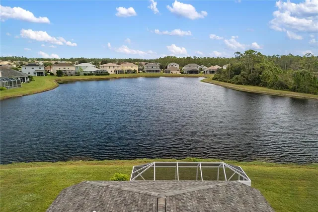 an aerial view of a house with a outdoor space