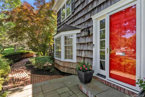 a outdoor space with lots of potted plants