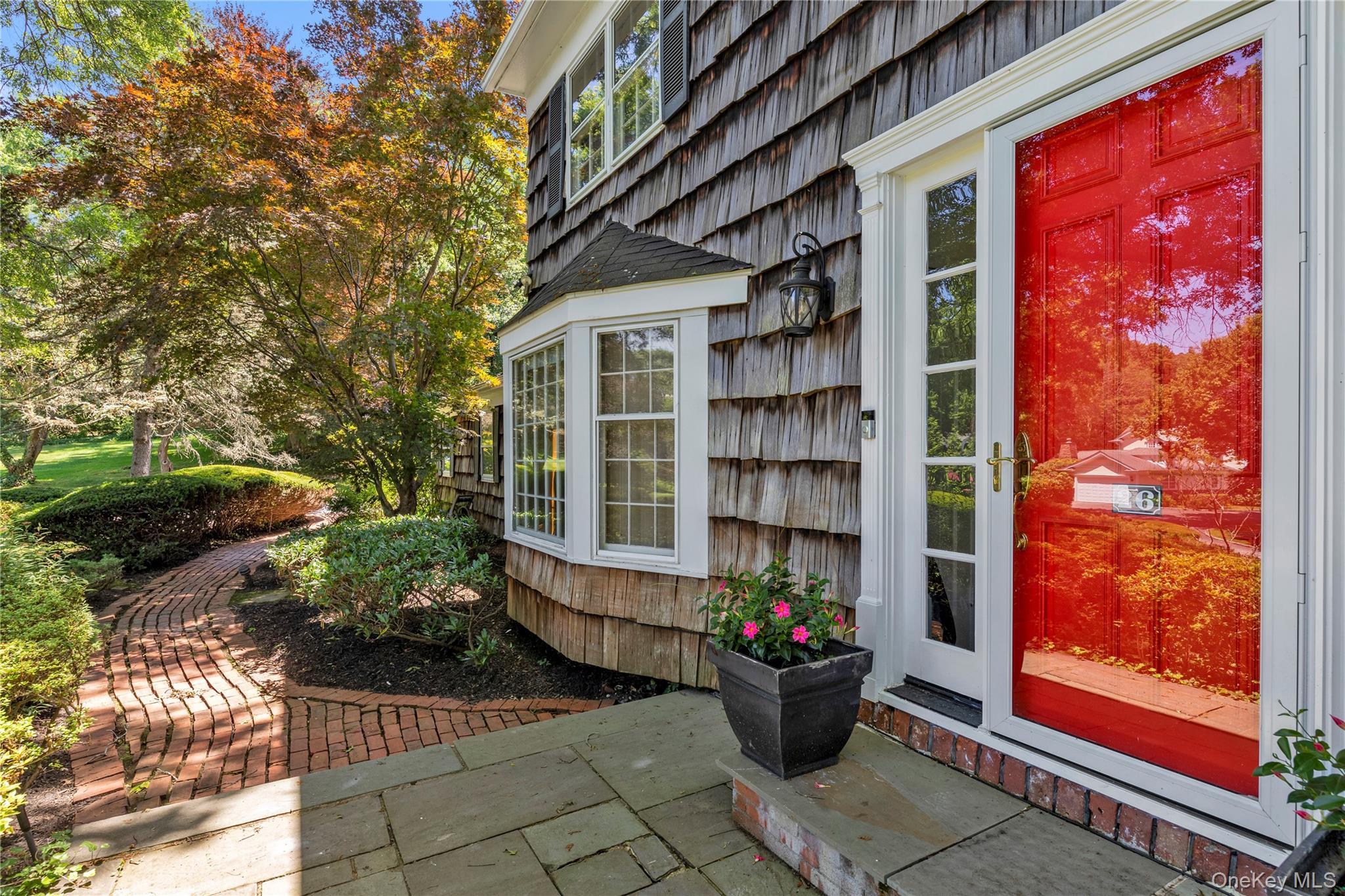 26 Rolling Drive Glen Head, NY 11545 - Photo 11 of 31 a outdoor space with lots of potted plants
