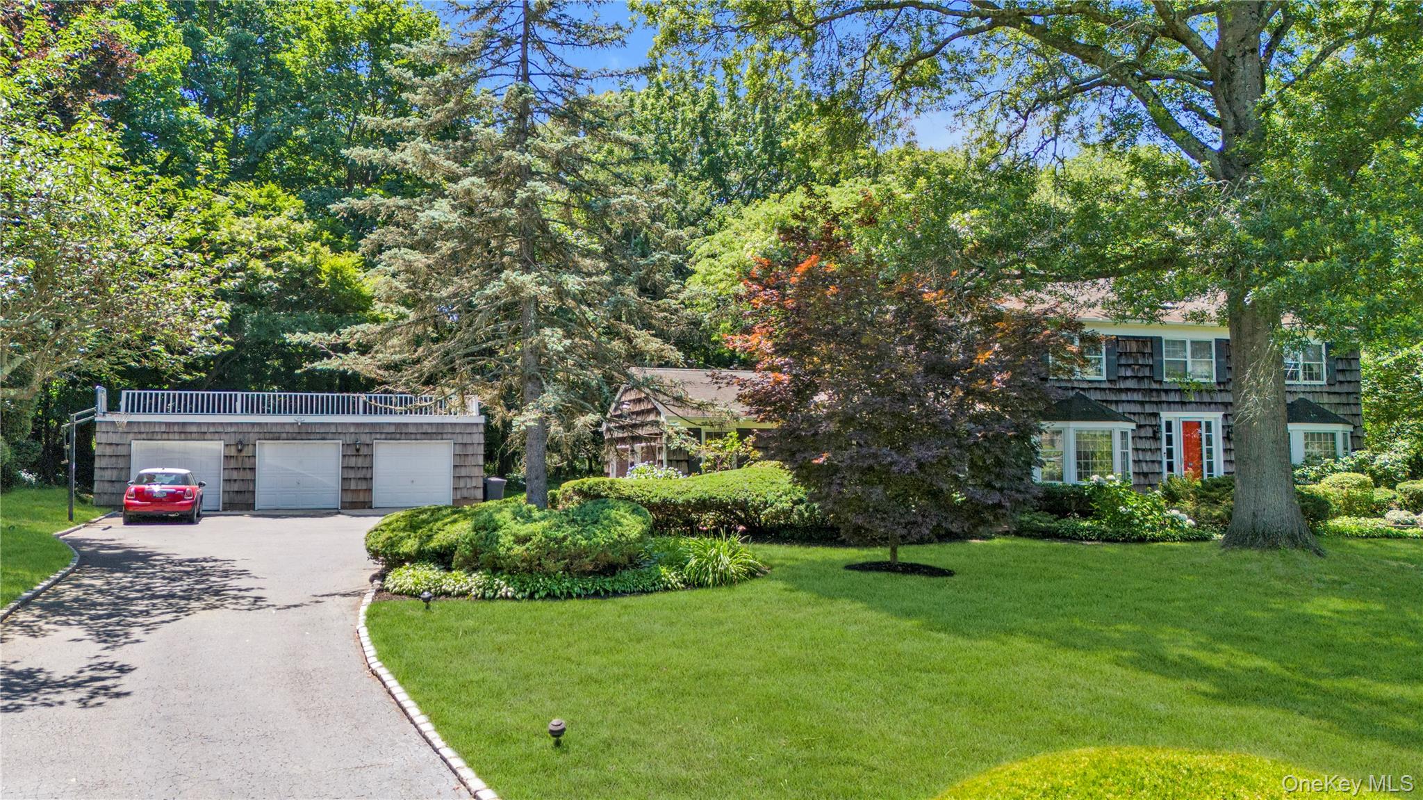 26 Rolling Drive Glen Head, NY 11545 - Photo 2 of 31 a front view of a house with a yard